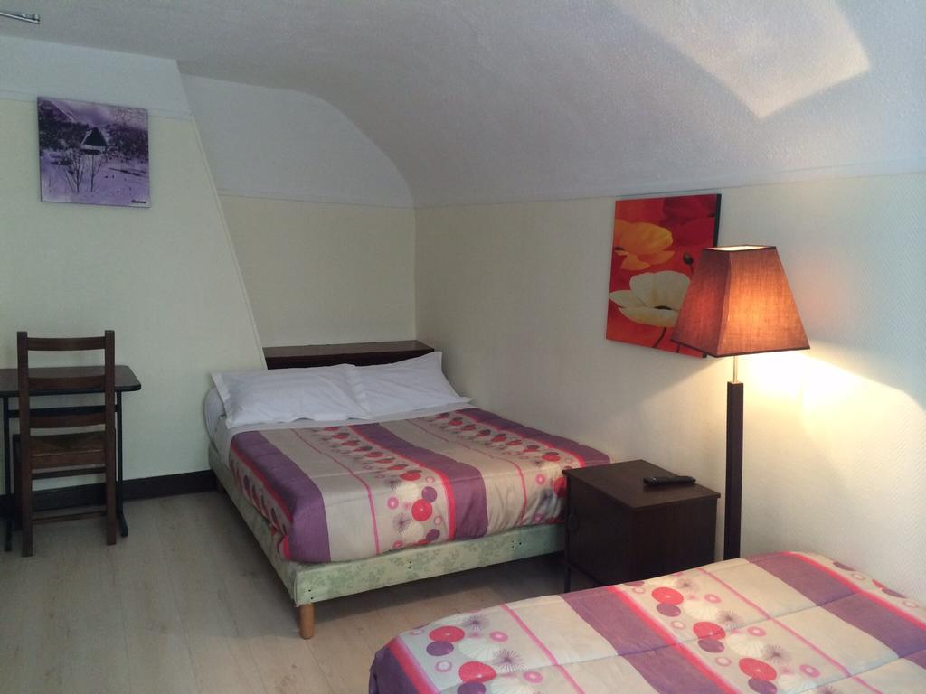 Hotel Restaurant Tokyo Trouville-sur-Mer Quarto foto
